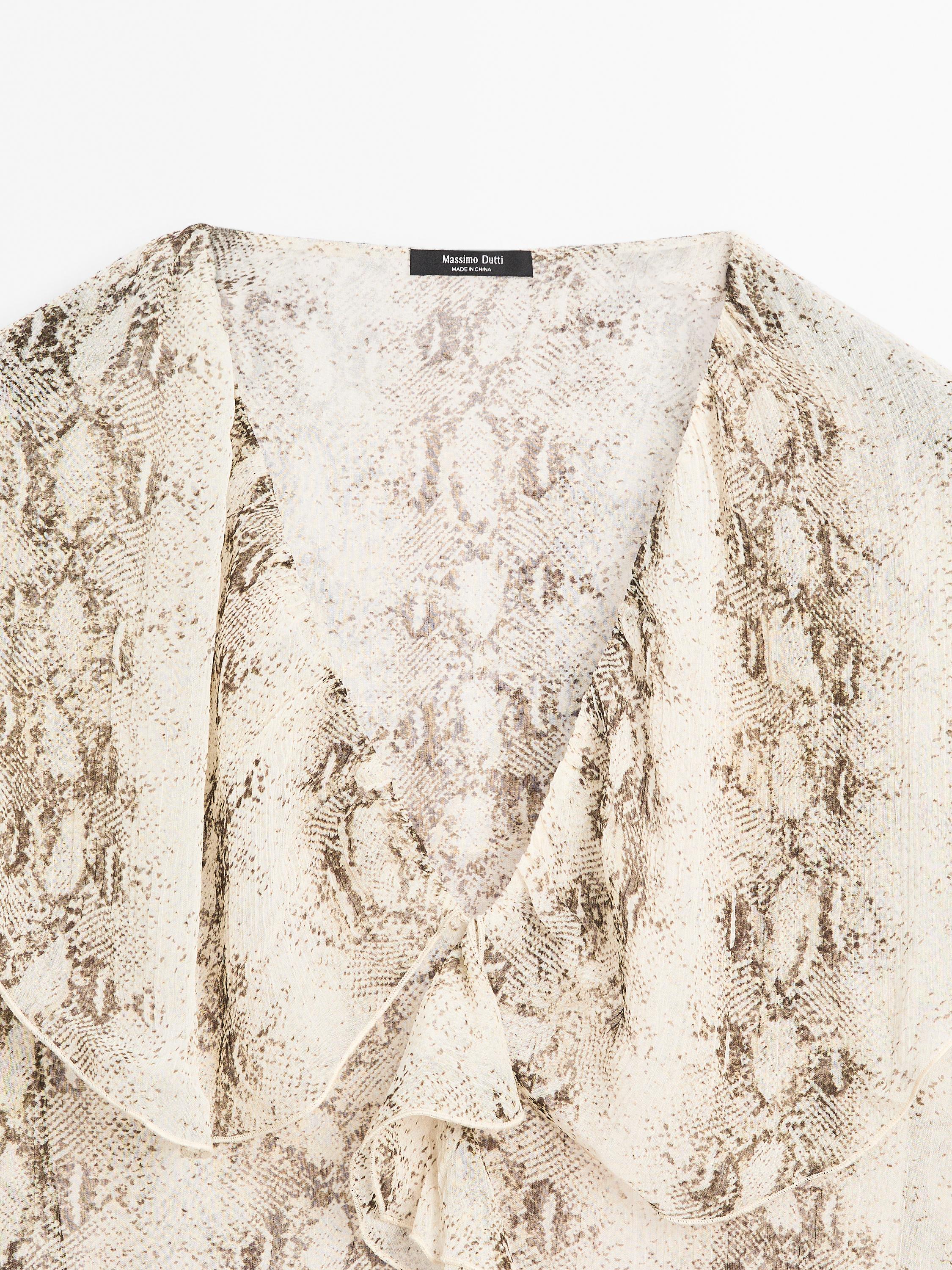 Snakeskin print blouse with ruffles